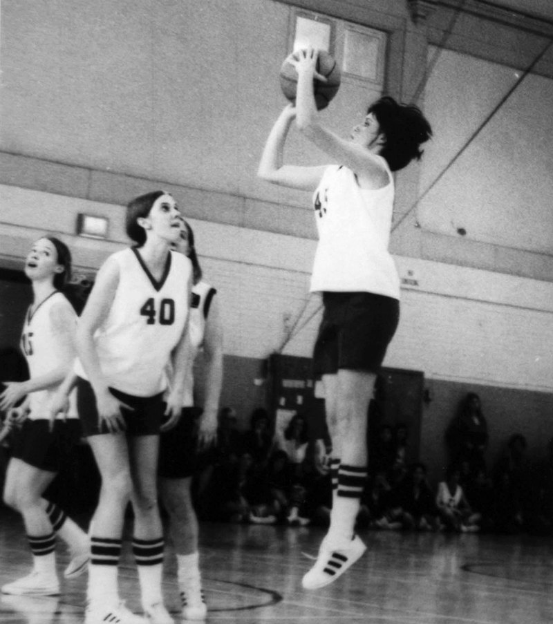 Debbie shoots for a basket on her first organized team at Indiana University